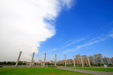 Fototapeta na wymiar Chinese totem pole landscape architecture in a park
