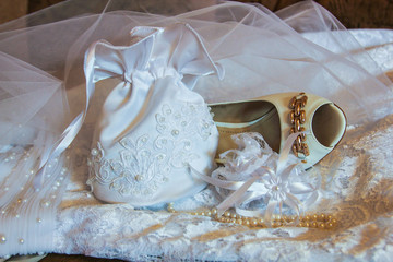 Slipper, handbag and beads of the bride in Kazan, Russia