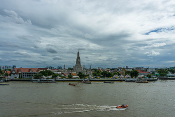View of Wat Arun across Chao Phraya River in Bangkok