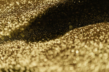abstract bokeh light on golden elegant background