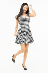  portrait of excited surprised attractive  inspired girl jumping up isolated on background.Freedom legs stylish feet glamorous people teenager asian.