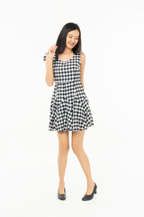 Fototapeta premium portrait of excited surprised attractive inspired girl jumping up isolated on background.Freedom legs stylish feet glamorous people teenager asian.