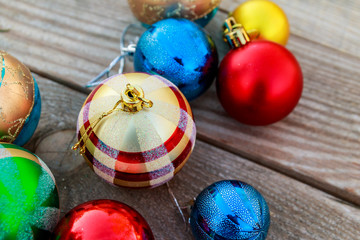 Christmas baubles on wooden background