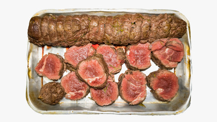 The meat is usually in a tray on a white background.