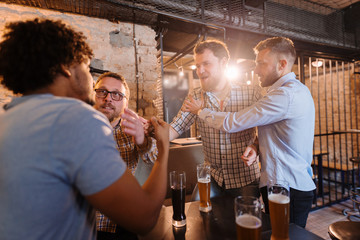 Group of men starting a fight.