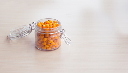 sea-buckthorn berries and autumn leaves, alternative medicine