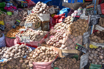 Arequipa, Peru - October 7, 2018: Potato varietals on sale in the central market, Mercado San Camilo