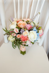 Sweet wedding Bouquet with roses of the Bride