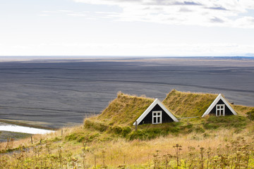 Fototapeta na wymiar Beautiful rural huts overlooking the landscape. Europe Iceland