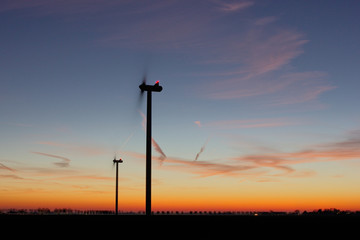 Obraz premium Windmill Wind Power New Energy Sunset Sky Evening