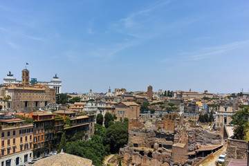 Fototapeta na wymiar Panorama of Ruins of Roman Forum and Capitoline Hill in city of Rome, Italy