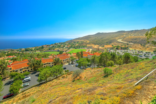 Scenic landscape of Pacific Coast in California. Panoramic aerial view of Pepperdine University, an American university in Malibu, Unites States. The campus on the hills overlooking the Pacific Ocean.