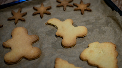 Christmas cookies on baking tray. Gingerbread cookies. Chritsmas concept.