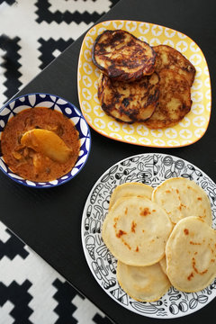 Traditional Malaysian pencake local called "lempeng" with chicken curry gravy