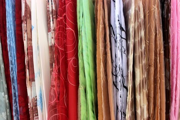Colorful fabrics curtains tulle dresses sale at street market
