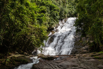 Fototapeta na wymiar A beautiful waterfall in the tropical rainforest