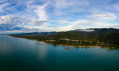 Aerial view of a tropical beach and ocean at sunset (Khao Lak, Thailand)