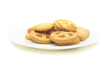 one side of butter cookies on plate with white background .