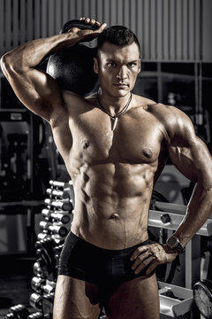 guy bodybuilder with weight © tankist276