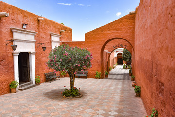 Fototapeta na wymiar Arequipa, Peru - October 7, 2018: Interior courtyards of the Monastery of Santa Catalina de Siena, a UNESCO world heritage site