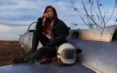 Portrait girl with flight helmet