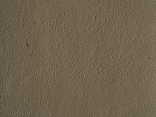 texture and background of dark brown embossed plaster