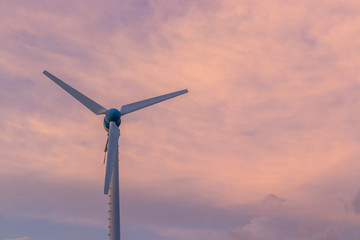 Wind turbine power generator at twilight