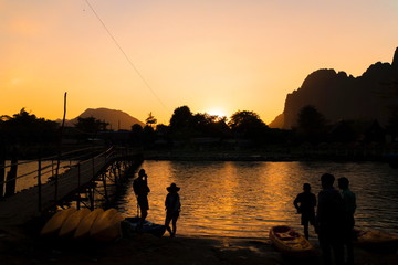 Sunset light and beautiful silhouette of mountain, Sunset at Vang Vieng - Vientiane, Laos
