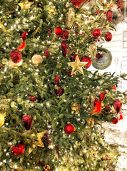 Fototapeta na wymiar Christmas tree decoration baubles stars ornaments lights Vintage