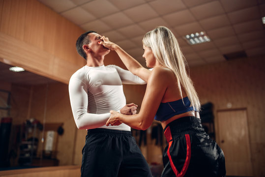Female person makes pain in the eyes, self-defense