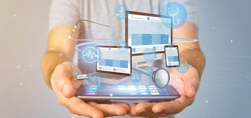 Businessman holding Devices with medical icon and stethoscope 3d rendering