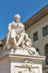 Fototapeta premium Alexander Humboldt statue outside Humboldt University in Berlin, Germany.