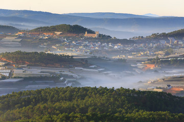 Village in mountain in mist day - Dalat, Vietnam