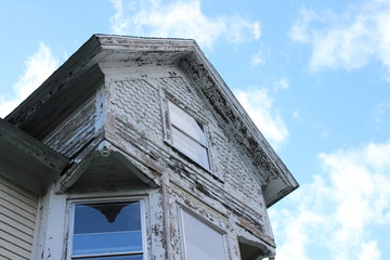 Brightly colored new England historic Victorian house