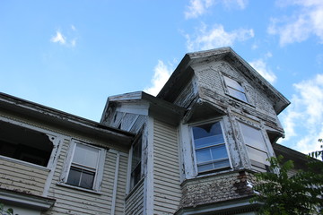 Brightly colored new England historic Victorian house