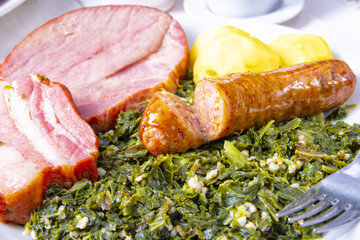 a delicious genuine oldenburger kale with peeked pinkel sausage