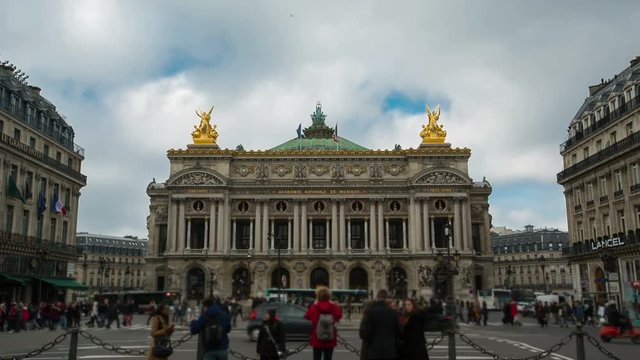 Opera in Paris with people and traffic