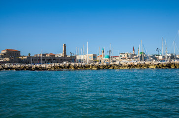 Fototapeta premium Acre, Israel - October 27, 2018 : Port of Acre and Sinan Pasha Mosque sea view