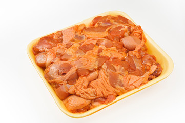 Fresh chicken chops with sauce in package