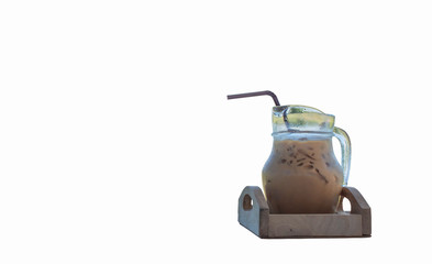 Iced coffee in a glass jar on  white background.