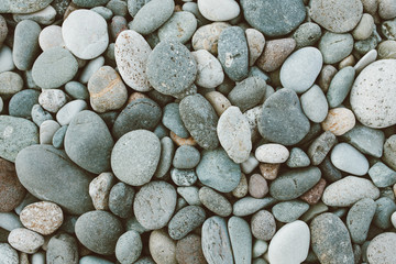 abstract background with dry round peeble stones. Sea stone close up