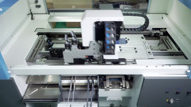 PCB Processing on CNC machine, Production of electronic components at high-tech factory