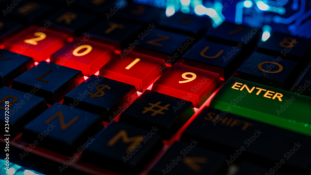 Fototapete close up view of keyboard with red light on 2019 number keys and enter key. technical concept for en