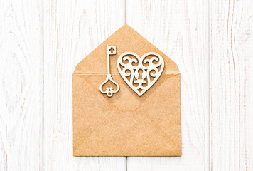 Vintage Valentine's Day Card. Old envelope with wooden hearts