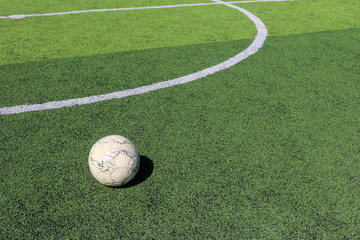 Football on artificial turf. It is for green background in a stadium