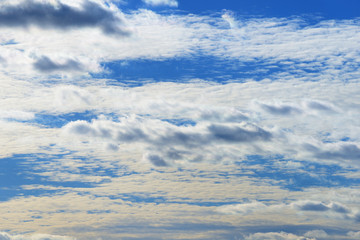 White clouds on the blue sky background