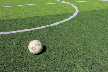 Football on artificial turf. It is for green background in a stadium