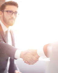 businessman shaking hands in office