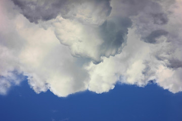 storm clouds against a blue sky