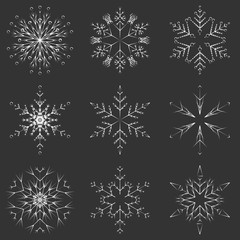 Obraz na płótnie Canvas Vector collection of artistic icy abstract crystal snow flakes isolated on background as winter december decoration group or collection. Ice or frost beautiful star ornament silhouette or season art
